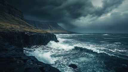 Obraz premium A dramatic coastline with rugged cliffs, crashing waves, and a stormy sky, copy space