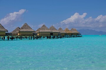 Crystal clear, turquoise waters fill the lagoon of Bora Bora