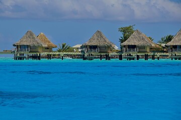 Crystal clear, turquoise waters fill the lagoon of Bora Bora