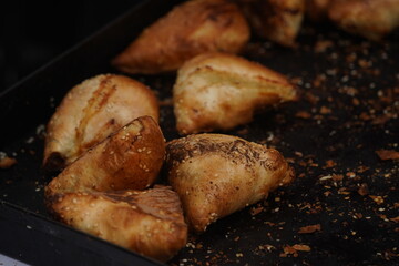 Baked tandoor samsa. Baking with different meats.