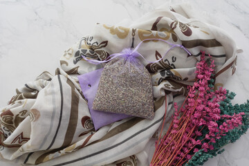 Lavender Sachet and a Beautiful Decorative Scarf Featuring Charming Floral Accents