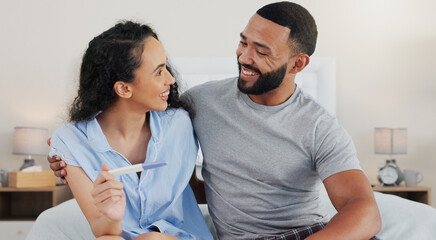 Fototapeta premium Happy couple, pregnancy stick and results in home, hug and support for positive baby news. People, plastic test and together for reading ovulation tool in bedroom, fertility treatment and embrace