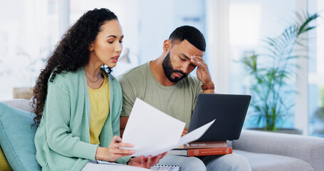 Frustrated couple, headache and documents with laptop for expenses, bills or financial problems on...