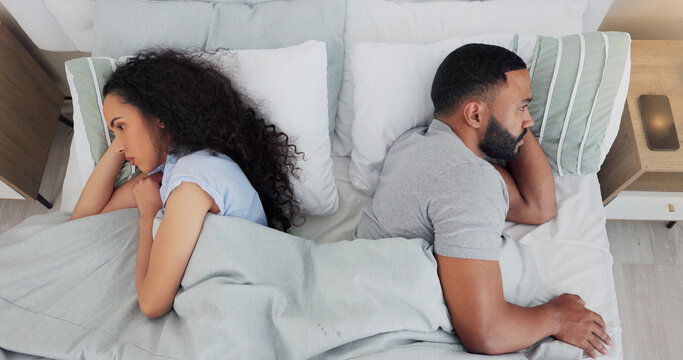 Couple, fighting and silent treatment in bedroom, toxic marriage and cheating affair in home. People, ignore spouse and unhealthy relationship for divorce or breakup, sex fail and argument in bed