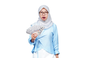 Surprised hijab asian woman with money isolated transparent