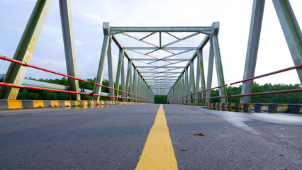 View From Below Of A Road With A Steel Truss Bridge In Belinyu Village, Indonesia