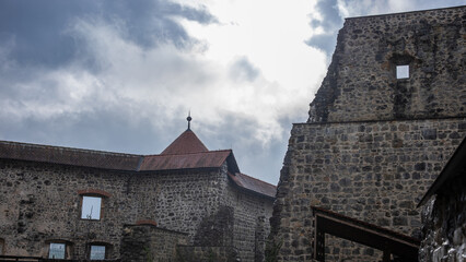 View of a zuzemberk castle, with partially renovated walls.