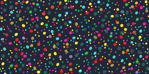 Colorful confetti scattered on a dark background