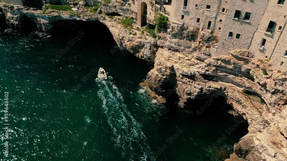 Wall mural Polignano a Mare’s Coastal Beauty Captured from Above