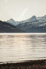 Winter morning at Lake Thun, Switzerland, with mountains