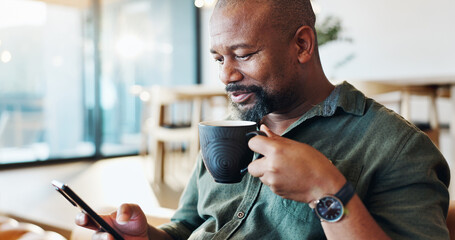Mature black man, phone and coffee in home with thinking, smile and reading email notification in...
