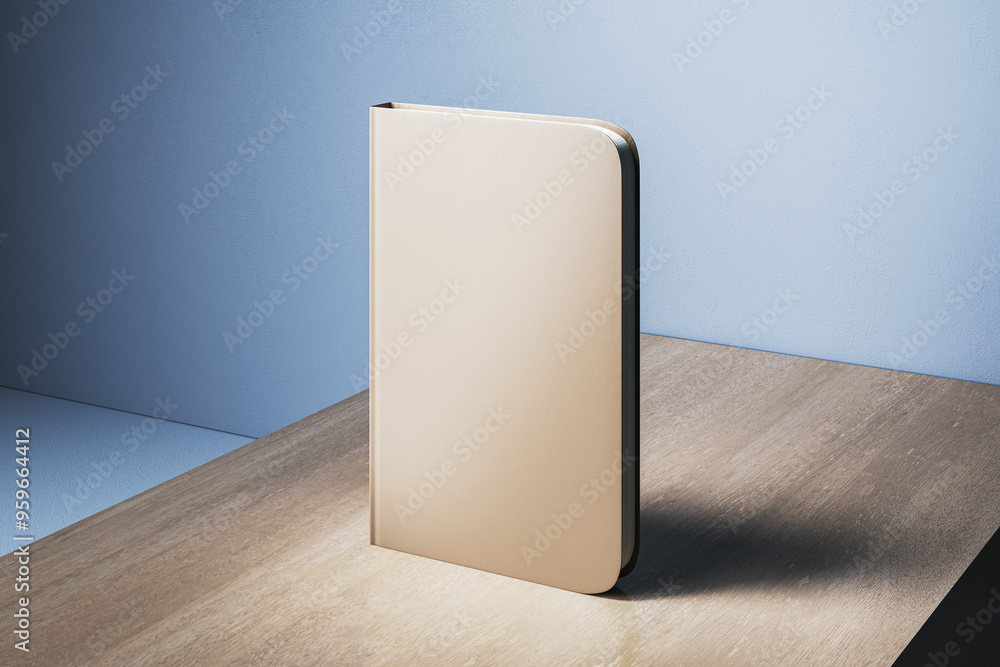 Poster empty closed beige notebook with mock up place on wooden desk and concrete wall background backgroun