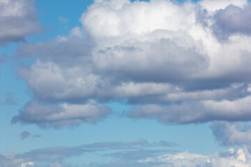 White clouds against a blue sky