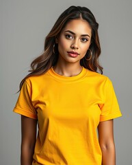 Obraz premium Portrait of beautiful woman young lady model smiling in yellow t-shirt