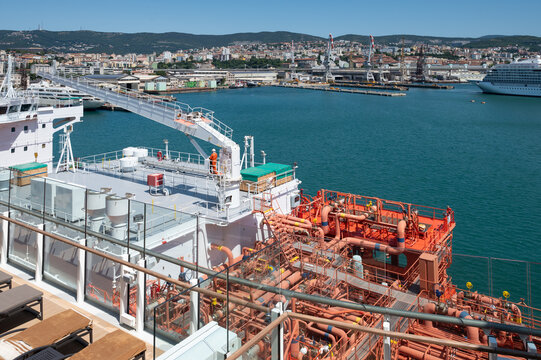 LNG tanker supplies cruise ship with clean energy with fewer emissions in the port of Trieste, Italy