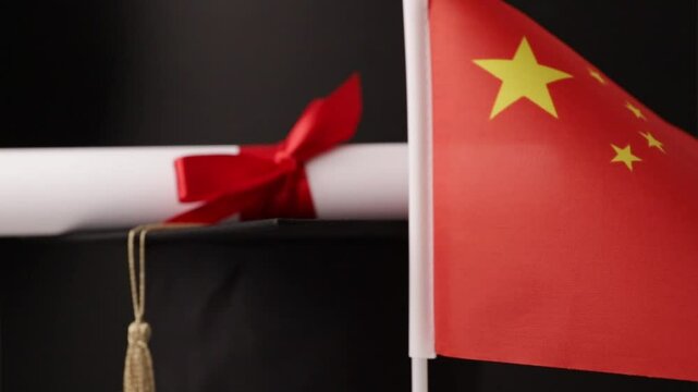 Chinese education and language learning, graduation cap with diploma and flag of China, asian university degree and celebration