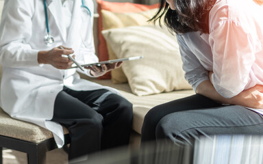 Abdominal pain in woman with stomachache illness from menstruation cramps, stomach cancer,...