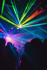 Colorful laser beams illuminate a vibrant dance floor, creating an electrifying atmosphere for nightlife and celebration.