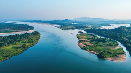 Aerial shot of the Mekong River near Kratie, with its many islands and sandbanks creating a dynamic landscape.