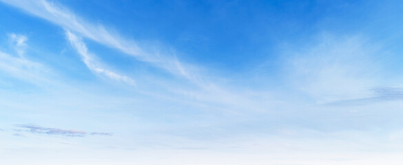 clear blue sky with a few clouds