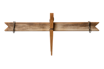 A vintage wooden clothespin hanging on a white clothesline, isolated on a white background