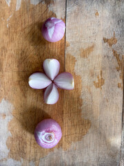Allium oschaninii on wooden background