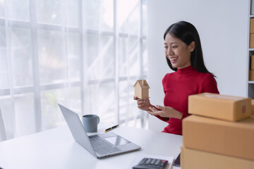 woman, online seller, uses live streaming to present items from her home, engaging with customers in real time to boost sales and showcase products