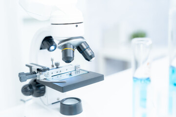 analyze biochemical samples in advanced scientific laboratory. Medical professional use microscope look microbiological developmental of viral. Biotechnology research in science lab...