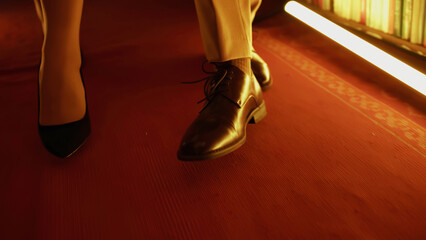 Close up of legs on red carpet. Stock footage. Concept of the official event.