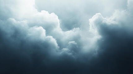 Obraz premium White clouds stand out against a dark background. The backdrop looks like fog or haze.