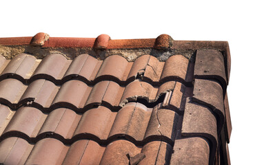 Damaged old roof tile in need of repair on white background.