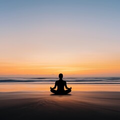 A serene silhouette of a person meditating on the beach during a colorful sunset, promoting tranquility and mindfulness.