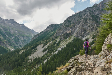 Beautiful views of the mountains and the glacial cirque on the route to the Refuge des Bans, in the &Eacute;crins National Park. Alps. France