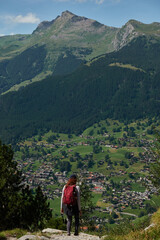 Hiking to the Gletscherschlucht glacier in Grindelwald, with imposing canyons, waterfalls and panoramic views of the valley. Swiss Alps