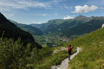 Hiking to the Gletscherschlucht glacier in Grindelwald, with imposing canyons, waterfalls and panoramic views of the valley. Swiss Alps
