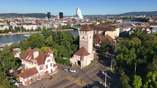 Basel with st. johanns tor and cityscape in the background during a sunny day, aerial view