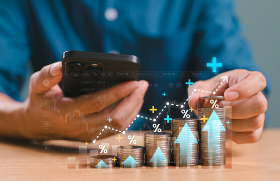 Interest rate increase concept, money percentage commission credit. Bank policy price raise. Businessman use mobile phone, coin, calculator, arrow and percentage symbol, financial banking increase - Powered by Adobe