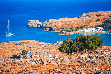 Lindos, Rhodes. Beautiful Lindos Beach, amazing place in Greek Islands, Aeagean Sea.