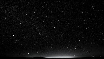 Obraz premium Starry night sky with a few stars above a field