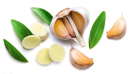 Garlic cloves with slices and green leaves isolated on white background