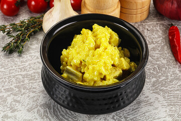 Italian cuisine - yellow risotto with chicken