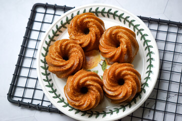 Steamed caramelized sweet and soft cake, locally known as Kuih Apam Gula Hangus.