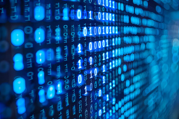 Obraz premium Blue digital binary data on computer screen background