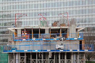 Top of Skyscraper Scaffoldings Support Columns at Construction Site in London Winter Day
