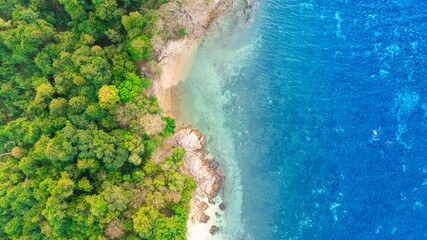 Top view beach sand background for summer vacation concept. Beach nature and summer seawater with sunlight light sandy beach Sparkling sea water