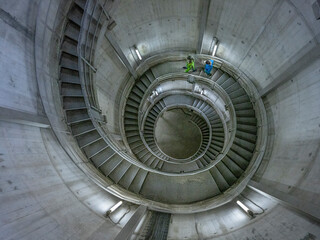 View of spiral staircase in concrete structure for fish way at Shiromaru Dam, Okutama Town, Tokyo Prefecture, Japan.
