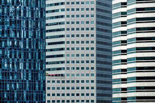View of congested city skyline with modern skyscrapers and intricate architecture, Singapore.