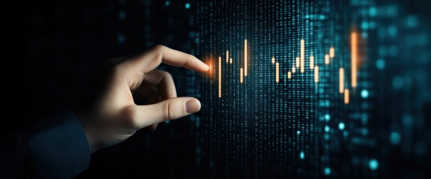 A hand is pointing at a graph with orange lines