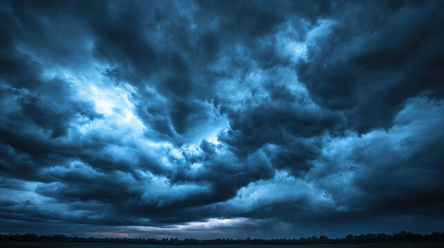A dynamic scene of stormy weather with a dark sky, swirling clouds and lightning lighting up the horizon, creating a dramatic and intense background.