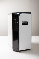 Oxygen concentrator machine on white background. Treatment equipment from hypoxia, coronavirus and other respiratory diseases.